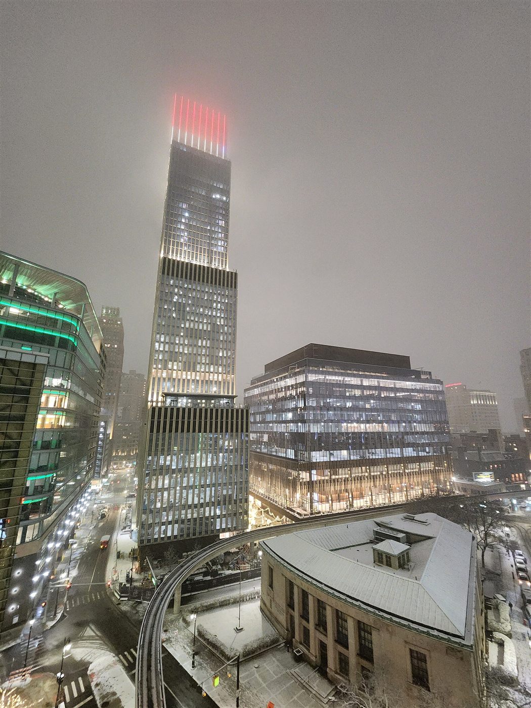 Hudson's Detroit tower lit up on a snowy night in downtown Detroit